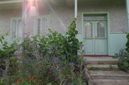 Her house was so cute, I really liked all her flowers, fruit and vegetables around #Danube Delta #Romania